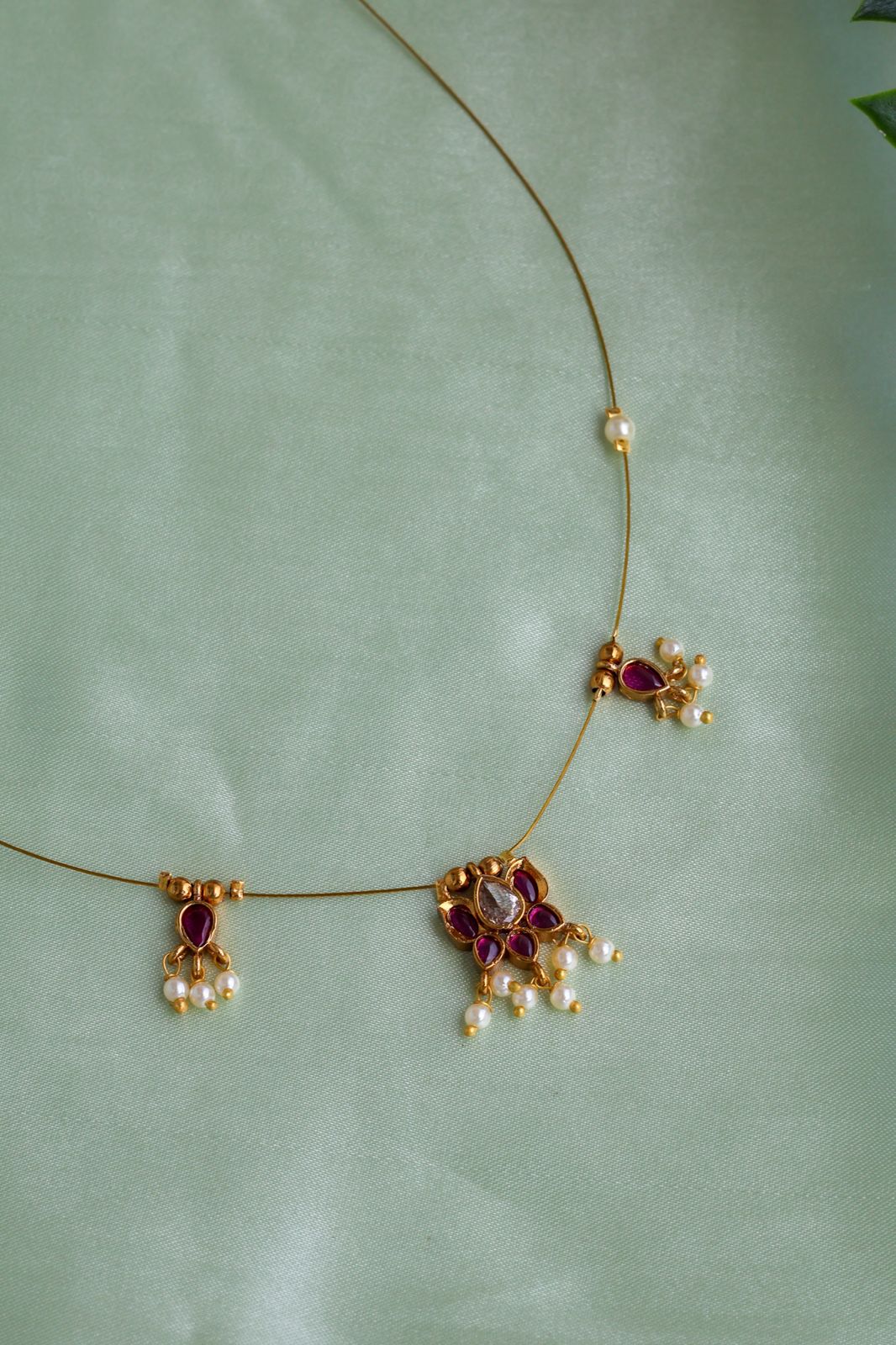 Invisible Kemp Ruby Lotus Chain