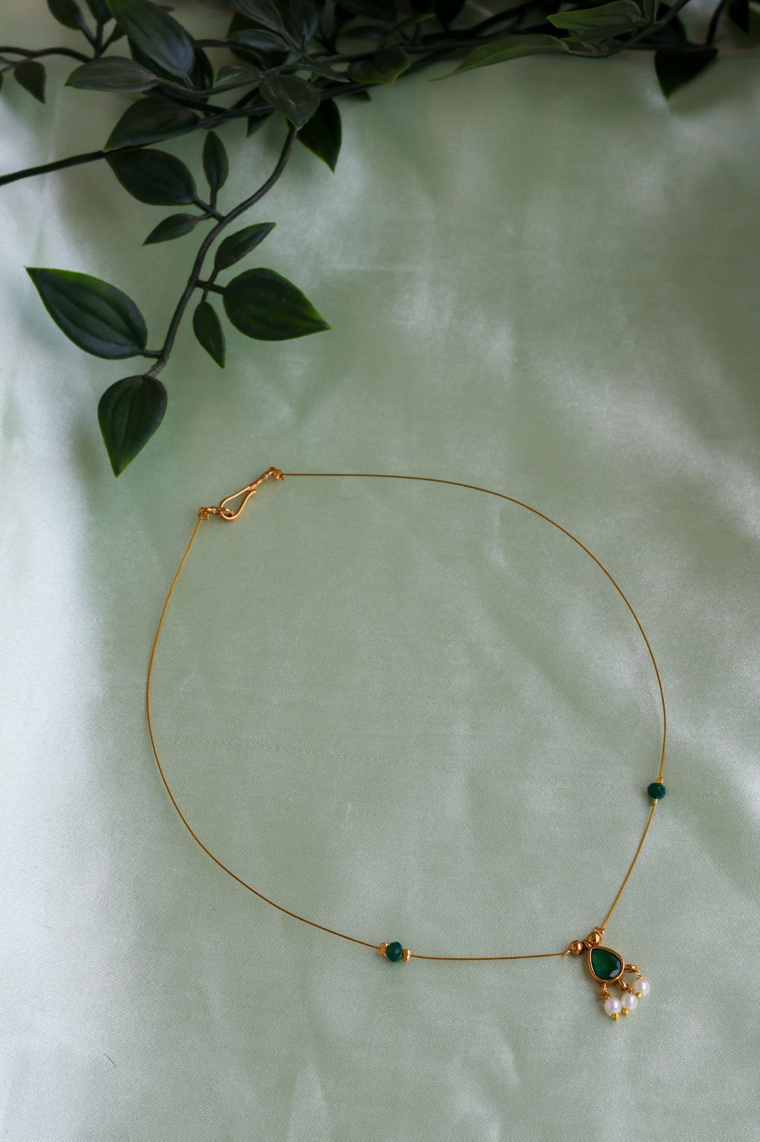 Invisible kemp ruby/emerald chain