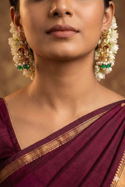 Temple motif earring with green bead drops